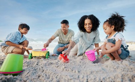 Photo for Parents, kids and sandcastle at beach, bucket and digging for bonding, outdoor and vacation in summer. Mom, dad and siblings with plastic toys, sand or construction game for holiday, happy and ocean. - Royalty Free Image