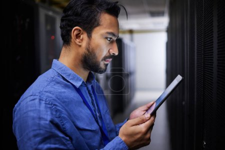 Photo for Tablet, man and reading in server room of technician programming at night. Information technology, focus and engineer in data center, cybersecurity network or coding software of system admin research. - Royalty Free Image