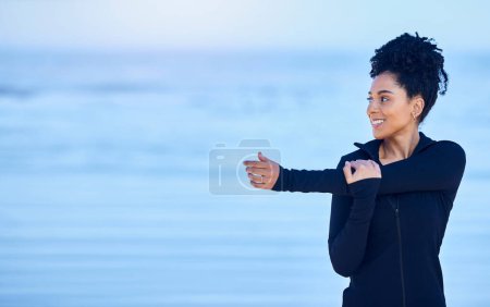 Photo for Woman, stretching and fitness on beach mockup and thinking of running, cardio health and training in nature. Athlete, runner or african person for warm up exercise, workout ideas and sports by ocean. - Royalty Free Image