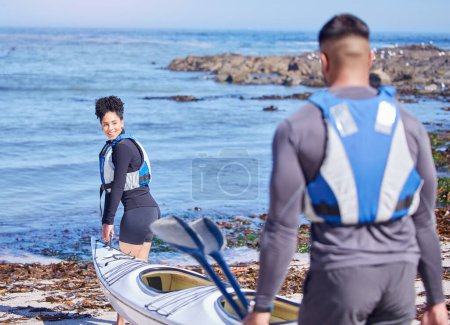 Photo for Water sports, man and woman with kayak, walking on sand at lake or beach for exercise together at vacation. Ocean holiday, adventure and fitness, happy couple helping with canoe for training workout - Royalty Free Image