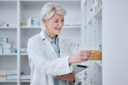 Photo for Pharmacy, senior woman and tablet with pills, inventory and checking stock with connection, smile and research. Old person, pharmacist and employee with technology, medical medication and telehealth. - Royalty Free Image