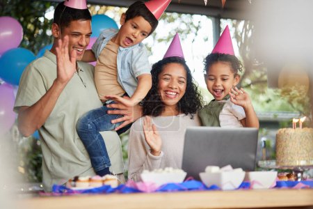 Photo for Family video call, birthday party and kids with laptop, cake or celebration for support, wave or happy in home. Child, flame and wish with contact, food and dessert with gift, hat or webinar at event. - Royalty Free Image