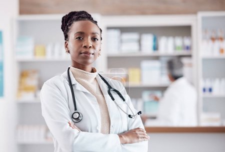 Photo for Pharmacy, pharmacist or portrait of black woman with arms crossed in healthcare clinic or drugstore. Proud nurse, wellness or confident African doctor by medication or medicine on shelf ready to help. - Royalty Free Image