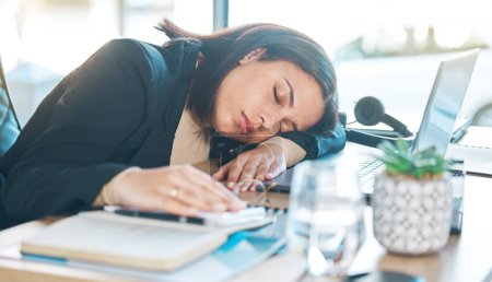 Photo for Tired, work and a woman at a desk for sleeping, corporate or working burnout in an office. Narcolepsy, table and a female business employee with a nap, rest or fatigue from company stress or job. - Royalty Free Image