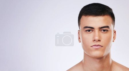 Photo for Man, portrait and skincare with facial and beauty treatment for skin glow and wellness in studio, Serious model, dermatology and cosmetics for relax face on white background, banner and mockup space. - Royalty Free Image