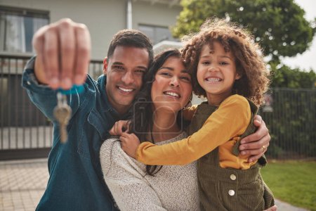 Photo for Happy family, portrait and real estate with keys in property, investment or new home together. Mother, father and child smile in relocation, buying or mortgage loan in building, finance or investing. - Royalty Free Image