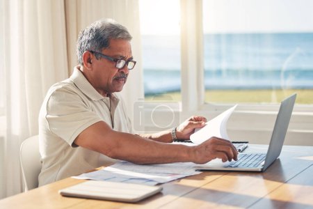 Photo for Senior man, laptop and documents in budget planning, schedule payment or checking bills at home. Mature male person working on computer, paperwork or expenses in finance, insurance or retirement plan. - Royalty Free Image