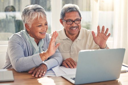 Photo for Senior couple, laptop and hello in video call, virtual meeting or communication together at home. Happy mature man or woman waving or talking on computer in online conversation or discussion in house. - Royalty Free Image