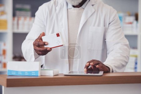Photo for Medicine box, tablet and hands of pharmacist typing product search, package info or digital checklist for clinic inventory. Pharmacy, medical pills and person research pharmaceutical supplements. - Royalty Free Image
