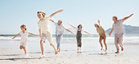 Photo for Happy family, children and airplane game on beach on playful holiday in Australia with freedom, love and energy. Kids, parents and grandparents, running, playing and bonding together on sea vacation - Royalty Free Image