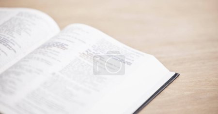 Photo for Closeup, bible or open book for faith, studying religion or healing with holy spiritual scripture. Christian literature, background or learning story for knowkedge education on God or Jesus Christ. - Royalty Free Image