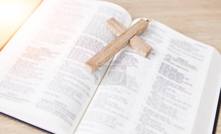 Photo for Bible, cross and religion, Christian and worship, faith and God with studying scripture closeup. Jesus Christ, prayer and spiritual, holy book and praise with crucifix for healing and gospel. - Royalty Free Image