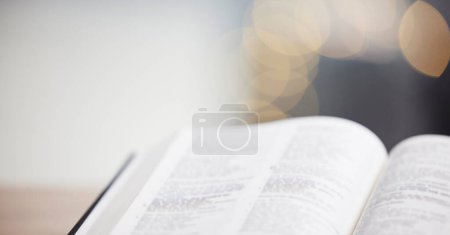Photo for Closeup, bible or book for faith, studying religion and mindfulness with holy spiritual scripture. Christian literature, background or learning story for education or knowkedge on God or Jesus Christ. - Royalty Free Image