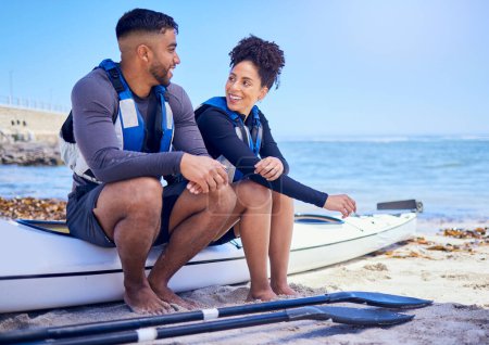 Photo for Couple, kayak and outdoor for travel adventure at a beach with a partner for teamwork. A happy man and woman with a paddle for canoeing, water sports and vacation or fitness while talking in nature. - Royalty Free Image