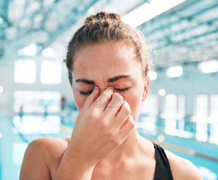 Photo for Stress, headache or face of woman swimmer in fitness, exercise or workout with anxiety or fatigue. Tired, hand or sick athlete with migraine, sports injury or head pain frustrated by training problem. - Royalty Free Image