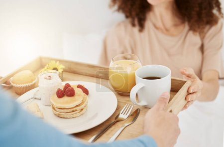 Photo for Breakfast on tray, morning and couple in bed for birthday, anniversary celebration and romantic gesture. Relationship, love and happy people with healthy food for wellness, nutrition and surprise. - Royalty Free Image