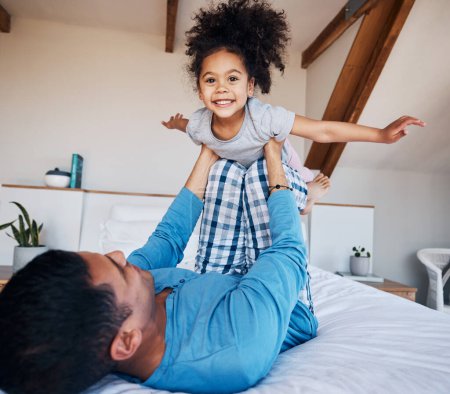Photo for Portrait, airplane and smile of girl child with father in bedroom flying for fantasy, happiness, and fun in modern apartment. Face, love and man lifting young kid on knee in family home for play. - Royalty Free Image