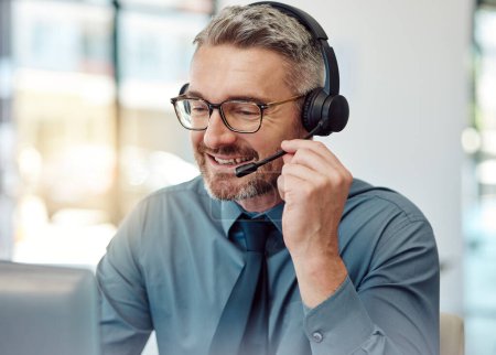 Photo for Senior, happy man and call center with headphones in customer service, support or telemarketing at office. Mature businessman, consultant or agent smile in online advice, help or contact us at desk. - Royalty Free Image