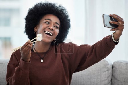 Photo for Food, selfie and black woman with sushi, chopsticks and post of seafood or eating healthy dinner in home on social media. Influencer, person and photography of fish, dish or diet on blog or video. - Royalty Free Image