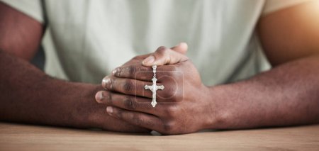 Photo for Rosary cross, person hands and prayer beads in home with faith, christian praise and religion. Praying, necklace and worship in house with hope, gratitude and spiritual guide for support and healing. - Royalty Free Image