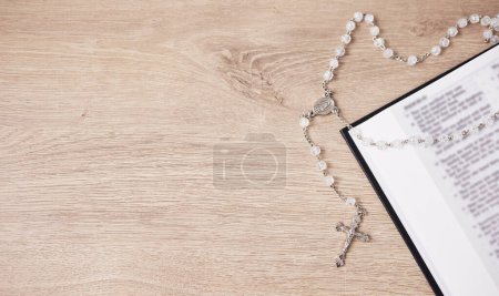 Photo for Bible, cross and religion, Christian and God with worship, studying scripture and rosary beads. Jesus Christ, prayer and spiritual, holy book and praise with top view, gospel and mockup space. - Royalty Free Image