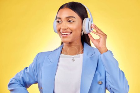 Photo for Headphones, smile or businesswoman streaming music or thinking of podcast on yellow background. Happy, relax or entrepreneur listening to radio song or audio sound on subscription playlist on a break. - Royalty Free Image