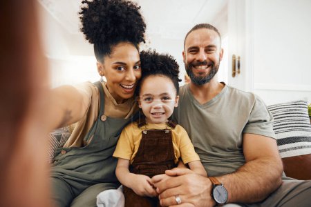 Photo for Family, selfie or happy on sofa and relax at home on social media, streaming or memory portrait. Smile, photography or love, care and trust for man, woman and interracial kid in lounge for bonding. - Royalty Free Image
