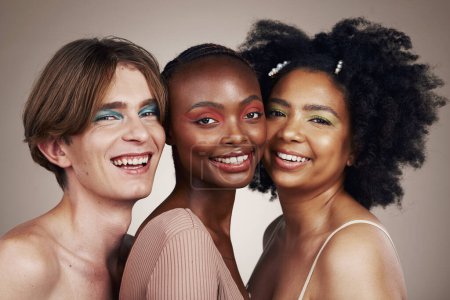 Photo for Portrait, diversity and people with makeup, smile and dermatology isolated on studio background. Face, man or women with cosmetics, multiracial or self care with inclusion, group with beauty or shine. - Royalty Free Image