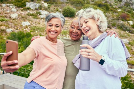 Photo for Senior friends, fitness or selfie of women on social media together for outdoor exercise in retirement. Photo, diversity or happy elderly people hiking to take pictures on break in training in park. - Royalty Free Image