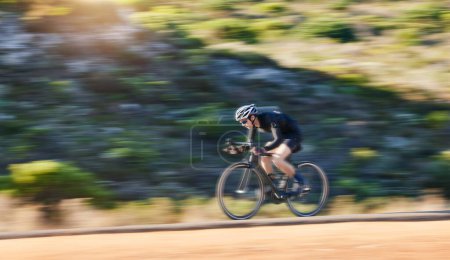 Photo for Motion blur, fitness and cyclist on bicycle on road in mountain with helmet, exercise adventure trail and speed. Cycling race, nature and man with bike for fast workout, training motivation or energy. - Royalty Free Image