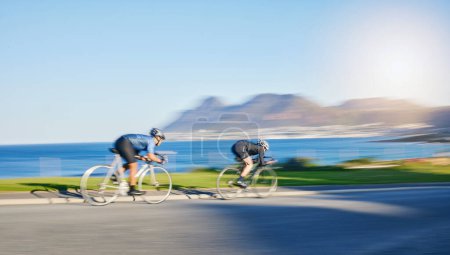Photo for Action, fitness and cyclist on bicycle on road together in mountain with helmet, exercise adventure and speed. Cycling race, nature and man with bike for fast workout, training motivation or energy - Royalty Free Image