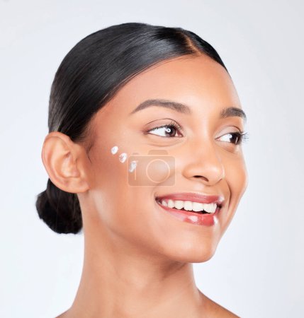 Photo for Cream, skincare and woman with cosmetics, beauty or self care on a white studio background. Person, thinking or model with creme, luxury or healthy skin with dermatology, glow or aesthetic with shine. - Royalty Free Image