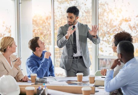 Businessman, presentation and coaching in meeting, planning or brainstorming in team strategy at office. Man or speaker talking to business people, training staff or project plan ideas in leadership.