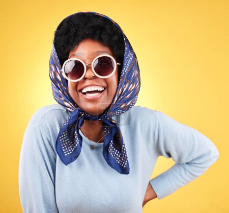 Photo for Fun, retro and woman laugh with sunglasses and smile closeup with vintage frames accessories in studio. African female model, confidence and happy with trendy summer fashion with yellow background. - Royalty Free Image