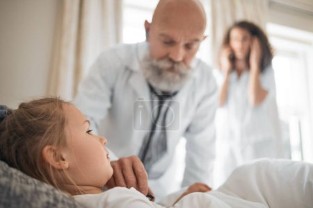 Photo for Sick, stethoscope and doctor with child in bedroom for consulting, breathing and medical checkup. Healthcare, helping and cardiology with people in family home for inspection, wellness and exam. - Royalty Free Image