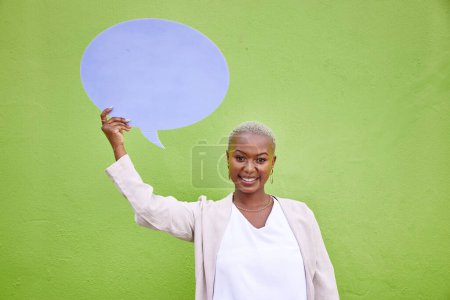 Photo for Black woman, speech bubble and portrait for mockup space, smile and opinion by green wall background. African girl, billboard and paper poster for voice, vote and social media with news announcement. - Royalty Free Image