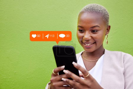 Photo for Woman, phone and texting with notification icon, typing or reading with web chat, blog and green background. African girl, contact and smartphone for communication, social network or overlay by wall. - Royalty Free Image