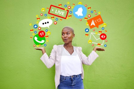 Photo for Social media, icon or connection with a woman at wall for emoji, live streaming app or message. African person hands for online chat, notification or network communication overlay on green background. - Royalty Free Image