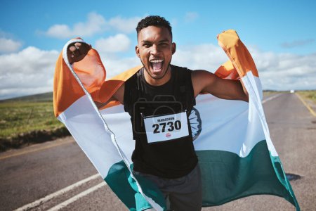 Photo for Celebration, portrait and man with flag of India or runner on a road in nature for success in race, competition or marathon. Sports, winner and athlete cheering for cardio, running or achievement. - Royalty Free Image