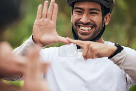 Photo for Cycling, sign language and a man in training outdoor for fitness or communication with a deaf friend. Team building, health and a cyclist talking to a sports person with a disability in nature. - Royalty Free Image