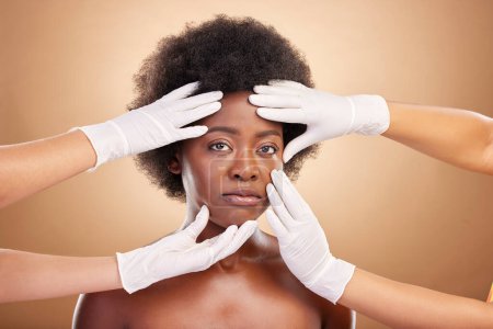 Photo for Skincare, hands and portrait of a black woman for botox, plastic surgery or face inspection. Medical, African person and doctors touching for facial check or dermatology on a studio background. - Royalty Free Image