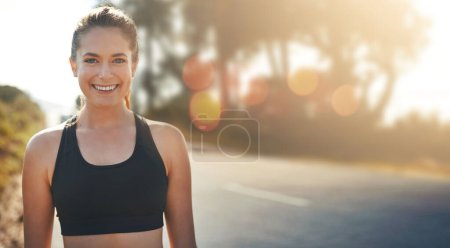 Photo for Fitness, portrait and woman outdoor at sunset to workout, training or cardio exercise on bokeh. Sports, face and runner athlete on road in nature for wellness, healthy body and happy smile in Canada. - Royalty Free Image