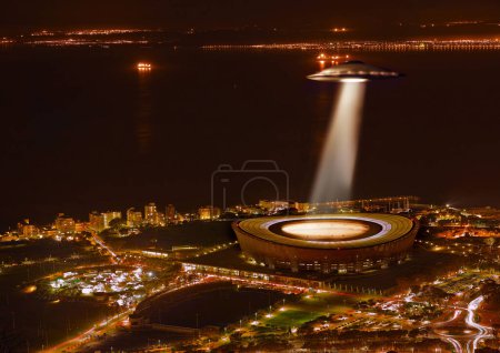 Photo for UFO, light and city in night, alien invasion and search with light on stadium in Cape Town. UAP ship, flying saucer and tractor beam in dark cityscape, metro or cbd for survey, inspection and flight. - Royalty Free Image