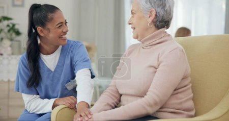 Photo for Medical, holding hands and happy with nurse with old woman on sofa for empathy, support and trust. Healthcare, retirement and rehabilitation with patient and caregiver in nursing home for healing. - Royalty Free Image