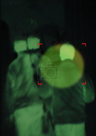 Photo for Military, enemy and target in night vision, overlay or dark green silhouette of spy, agent or terrorist risk to soldier. Police, surveillance and security people in infrared scope for army mission. - Royalty Free Image
