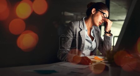 Photo for Business, night and woman with a headache, overlay and overworked with financial audit, tax and pain. Person, employee and worker with a migraine, tired and burnout with stress, dark and frustrated. - Royalty Free Image