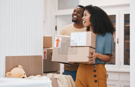 Photo for Excited black couple, box and moving in new home, investment or property together in happiness. African man and woman smile with boxes in renovation, relocation or house mortgage and apartment loan. - Royalty Free Image
