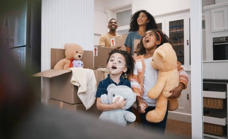 Photo for Family, moving and living room with kids, father and love together in a new home with toys. Mother, youth and children with dad and cardboard boxes with help, laugh and care in a house with a smile. - Royalty Free Image