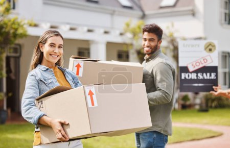 Photo for Couple, boxes and portrait for new home, real estate and property, homeowner and outdoor neighborhood. Young and happy interracial people with cardboard, moving in dream house together and sold sign. - Royalty Free Image