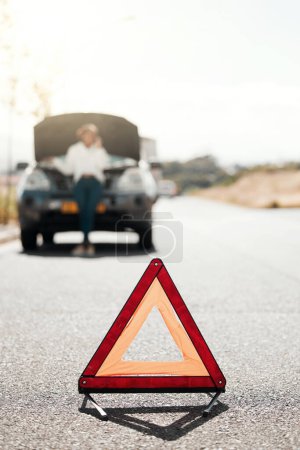 Photo for Car problem, stop sign or driver with stress or anxiety late from engine crisis on road or street. Blur, phone call or frustrated black woman talking by a stuck motor vehicle in emergency or accident. - Royalty Free Image